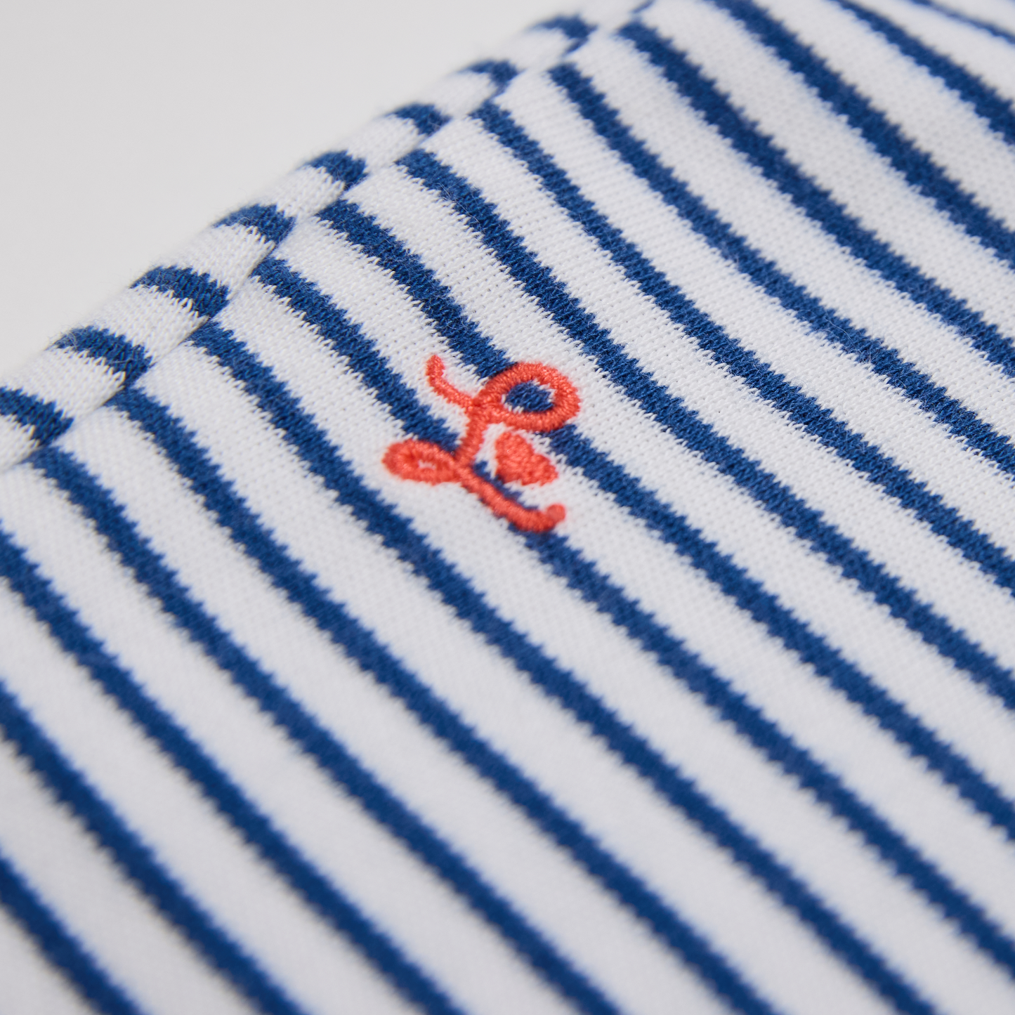 Interlock Jersey, Kinderhose, gestreift mit Logo Detailansicht