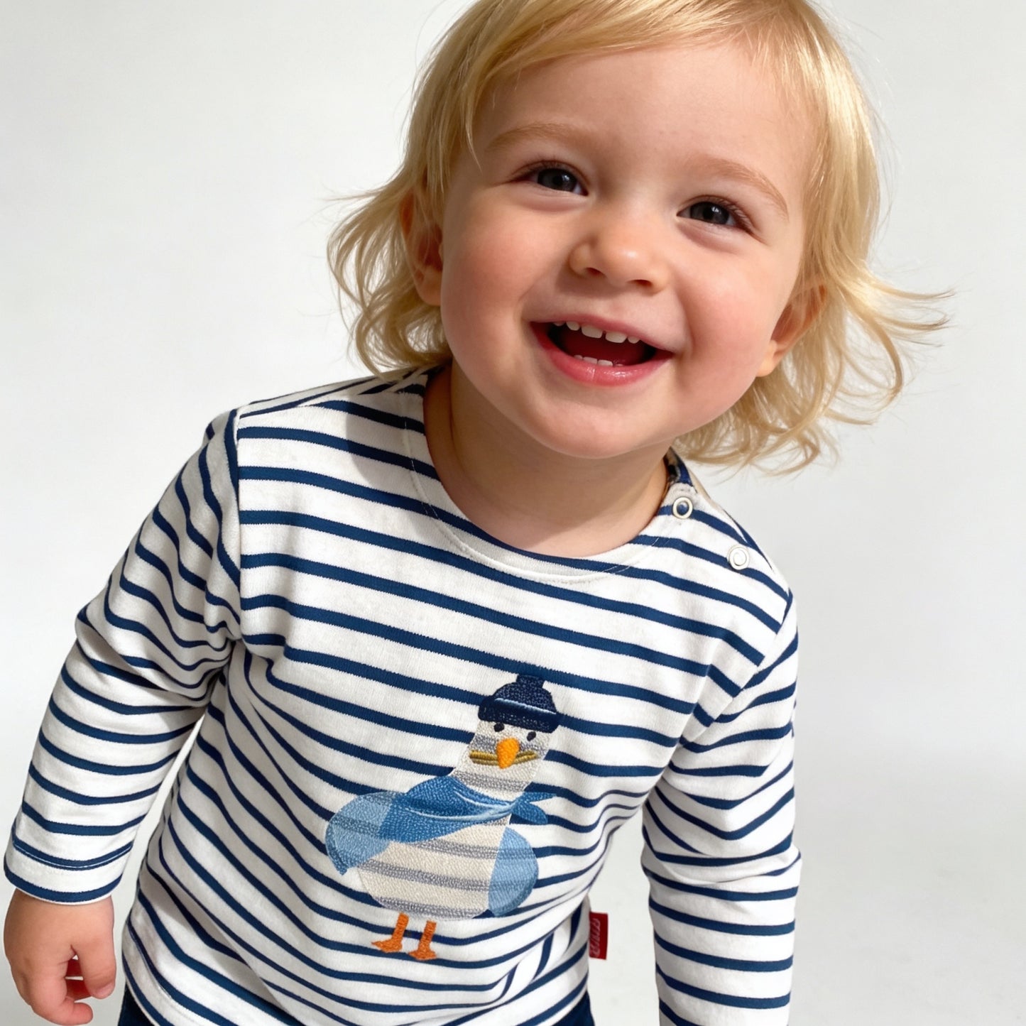 Langarmshirt in offwhite marine gestreift, Stickmotiv  "Möwe"